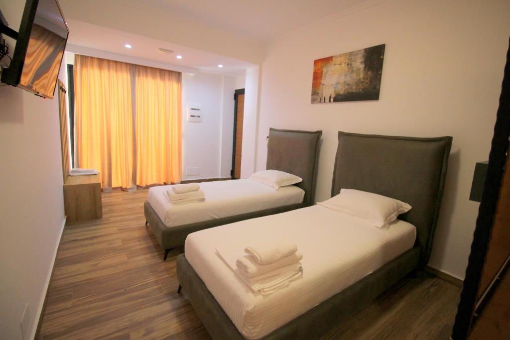 ortus rooms adults only hotel albania sarandë beds